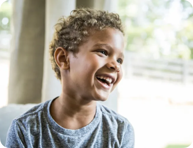 Six-year-old boy laughing