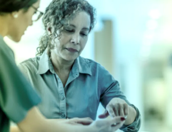 Two nurses talking to each other